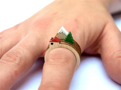 Laser Cut Wooden Rings That Feature Mini Dioramas