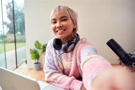 Pov Shot Of Female Vlogger Holding Camera Recording Video At Home Stock Image Image Of Podcast