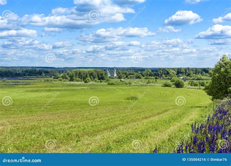 Beautiful Russian Landscape With Stone Village Church Stock Photo