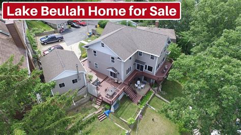 Sandstone bluffs surround half of the lake making for stunning views. Wisconsin Lake Homes for Sale - Lake Beulah - YouTube