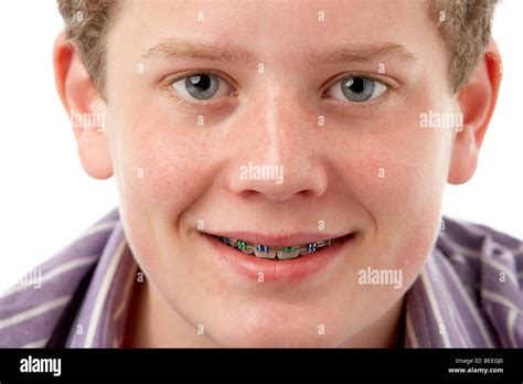 Studio Portrait Of Smiling Teenage Boy Stock Photo Alamy