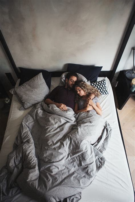 Young Couple Sleeping In Bed By Stocksy Contributor Lumina Stocksy