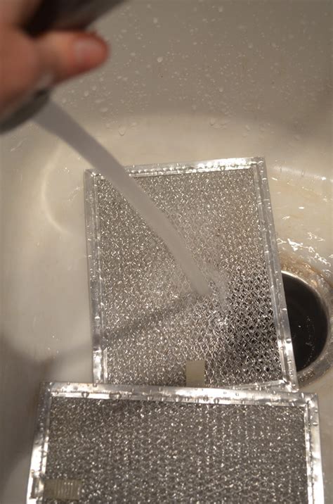 A dirty stove hood filter can attract pests and decrease indoor air quality. How To Clean A Greasy Hood Vent Filter Cleaning | Serena ...