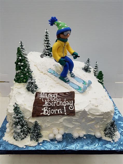 For other uses, see doughnut (disambiguation). Shaped skiing birthday cake iced in buttercream with a ...