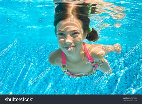 Child Swims Pool Underwater Happy Active Stock Photo 647376808