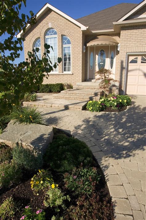 When a hard edge or corner is not appropriate in your landscape plan, this paving stone is the perfect solution. Unilock Brick Pavers | Luxury landscaping, Brick pavers ...