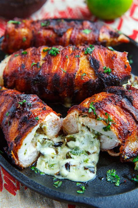 An easy low carb meal that's a total crowd pleaser! Bacon Wrapped Jalapeno Popper Stuffed Chicken - Closet Cooking