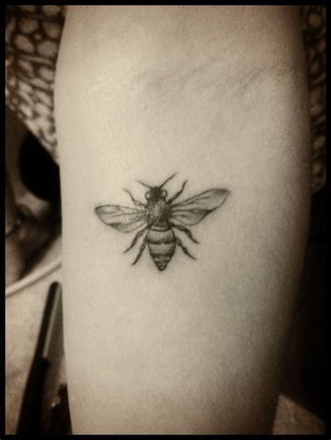Black And White Bumblebee Tattoo Design For Forearm