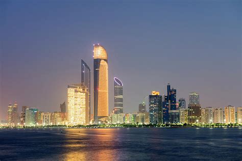 Evening View Of Skyscrapers In Abu Dhabi By Iain Masterton