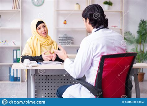 the female arab patient visiting male doctor stock image image of hijab explaining 148454123