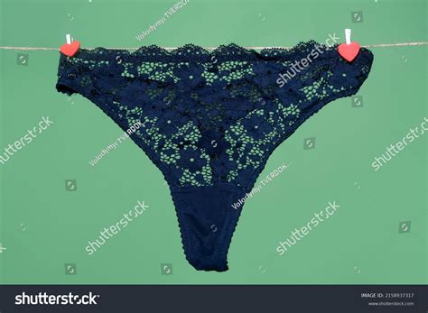 Womans Erotic Black Underwear Panties Hanging Stock Photo