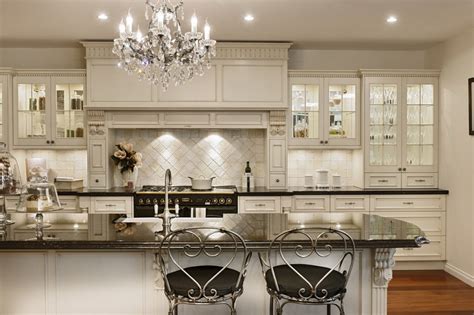 Like the cupboards and handles. 15 Inspiring White Kitchens - Celebrate & Decorate