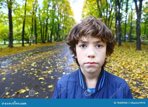 Boy Close Up Outdoor Sad Unhappy Portrait Stock Photo Image Of Jacket