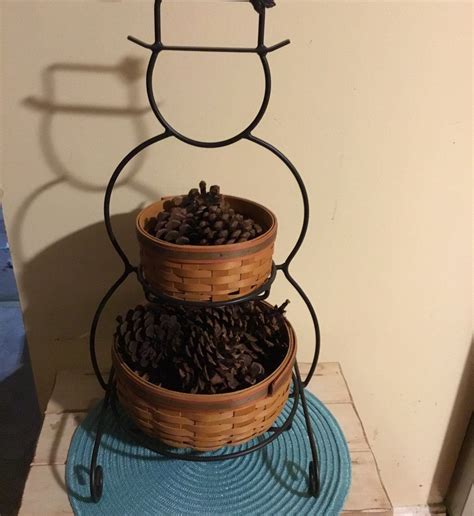 An office built to look like a giant basket. Longaberger snowman with baskets. Displayed last year with ...