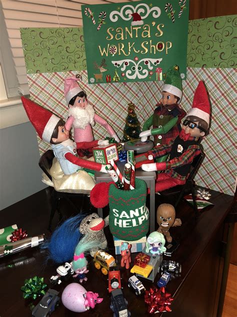 elf on the shelf santa s workshop elves are busy getting all the presents ready for xmas eve