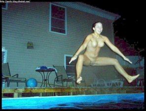 Naked Chick Jumping In The Swimming Pool Porn Pic