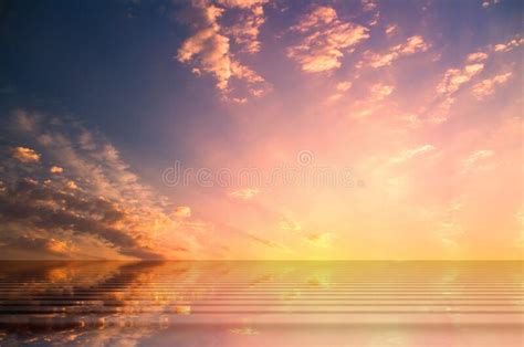 Sunset Pink And Blue Sky At Sea Water Reflection White Clouds Beautiful
