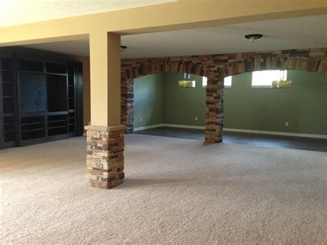 Maybe you would like to learn more about one of these? Stone archways in the basement @davidweekleyhomes | Stone ...