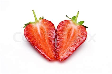 Two Halves Of Strawberries Folded Into A Heart Shaped
