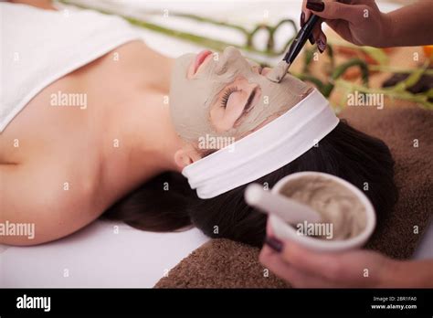 Young Beautiful And Healthy Woman In Spa Salon Traditional Oriental Massage Therapy And Beauty