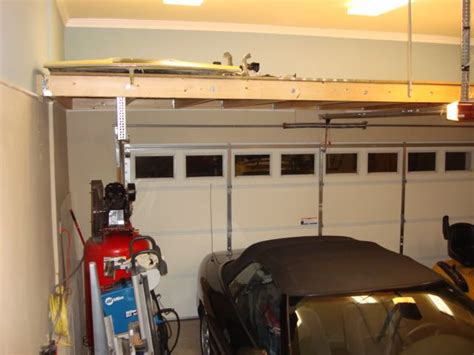 Organizing Practical Over Garage Door Storage Best Garage Design