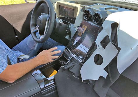 Offering spacious seating for five and a dedicated cargo space of 12.6 cubic feet. Burlappcar: 2021 Mercedes C-Class interior