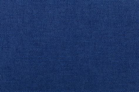 Dark Blue Background From Textile Material Fabric With Natural Texture