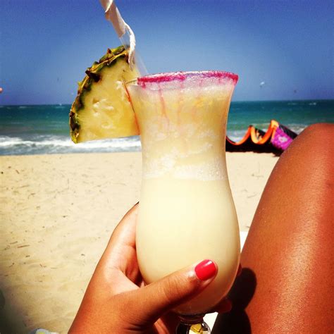 pina coladas on the beach in the dominican republic pina colada beach drinks dominican republic