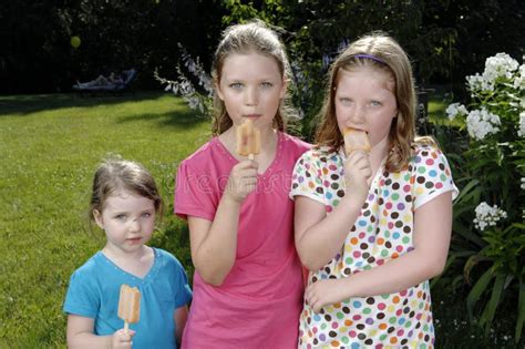 Girls Eating Popsicle Stock Photos Free And Royalty Free Stock Photos