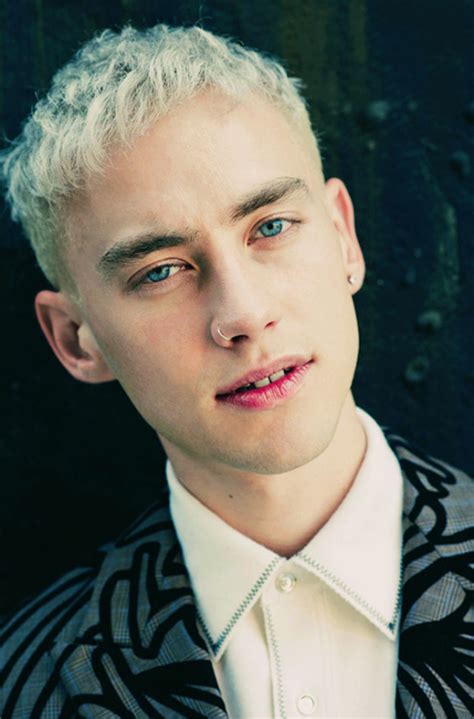 Olly alexander 's happy places is inside his head. Picture of Olly Alexander