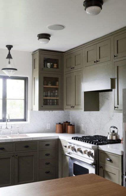 Beautiful kitchen features sage green cabinets paired with white. Kitchen cabinets painted grey green light fixtures 53 ...