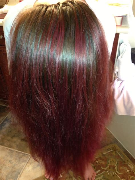 After the time is up, rinse your ends. Cat B's kool aid dip dye! I have SUPER dark hair and guess ...