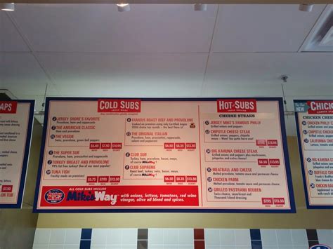 The menu also includes hot subs, signature wraps, a kid's meal for. Jersey Mike's menu board. - Yelp