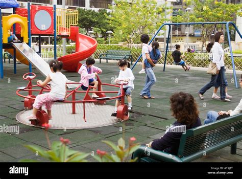 Macau Children Playing In Playground China Stock Photo Alamy