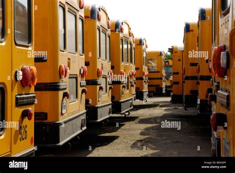School Buses Parked In A Depot Stock Photo Alamy