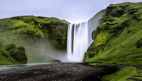 Landscape Photography Of Waterfalls On Green Mountain Iceland Iceland