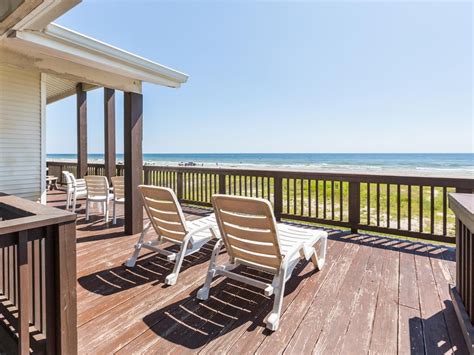 Shore Fun Enjoy The Wind In Your Fur In This Home Thats Just Steps Away From The Beach Sand