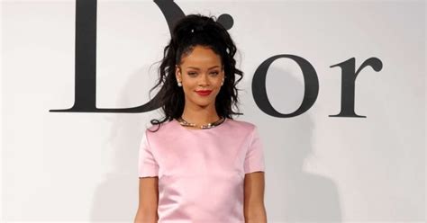 Rihanna Keeps It Sweet In A Pink Silk Dress At The Dior Cruise 2015