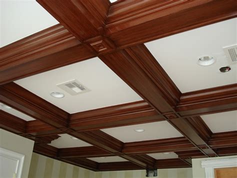 Soaring ceilings and wood beams inspire a designer creating her home and office in a converted historic church. Coffered Ceiling Molding - Design Build Planners