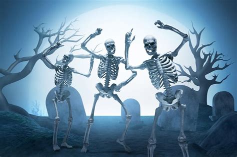 premium photo group of funny human skeleton dancing on graveyard cemetery with full moon