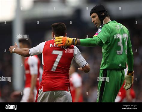 Arsenal Goalkeeper Petr Cech Right Consoles Arsenals Alexis Sanchez