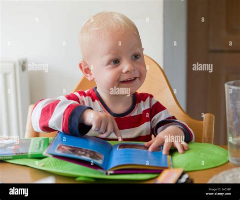 Child And Reading Book Hi Res Stock Photography And Images Alamy