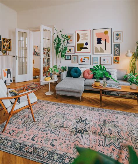 Mid Century Boho Interior With A Large Gallery Wall Using Abstract Art