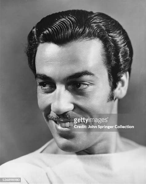 Cesar Romero Photos And Premium High Res Pictures Getty Images