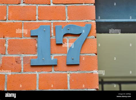 A House Number Plaque Showing The Number Seventeen 17 Stock Photo Alamy