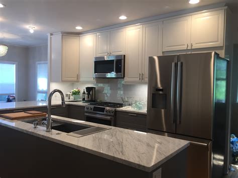 I'm aquila and my team of builders are the best of the best. Elegant Gray and White Bodyn IKEA kitchen | Basic Builders