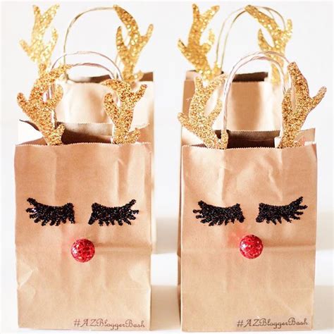 A great experience gift for a friend or family member. DIY Cute Reindeer Gift Bags Idea for Christmas party grab ...