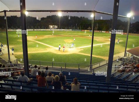 Little League Baseball Game At Night Stock Photo Alamy