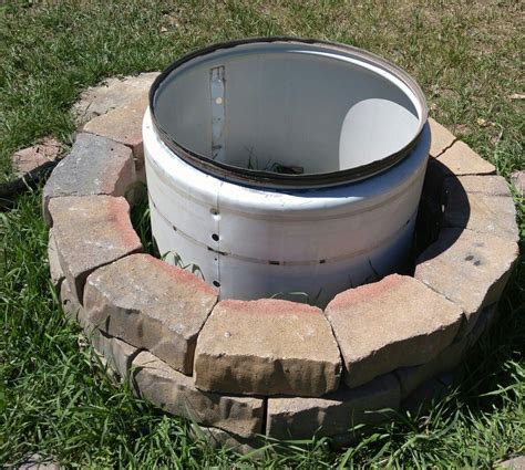 People also seem to use old washing machine drums, which have tons of holes all over them. Dryer drum fire pit | Outdoor fire pit, Fire pit, Yard decor