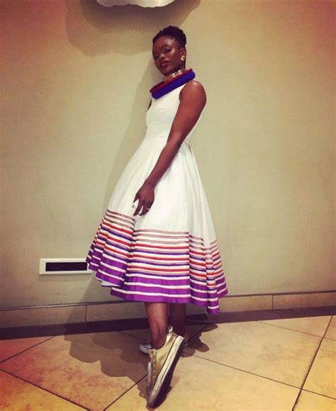 Unathi Wearing This Dress In White Accessorising It